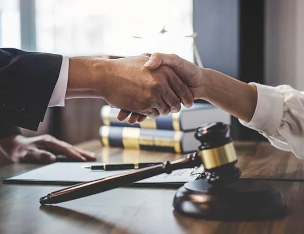 Team managing workplace standards to meet legal and ethical HR requirements.