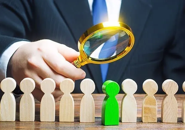 Recruiters evaluating candidates for permanent roles in a corporate setting.