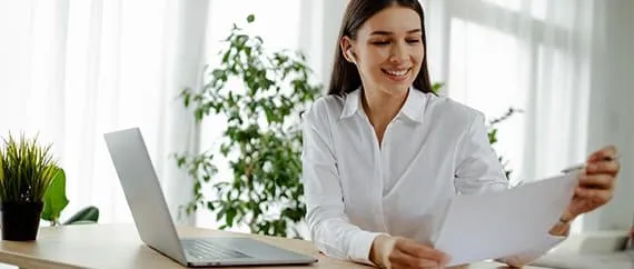 Taxpayer reviewing VAT return documents in Dubai with professional guidance.